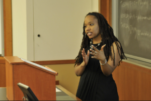 Photo of Sowande Mustakeem speaking at a podium