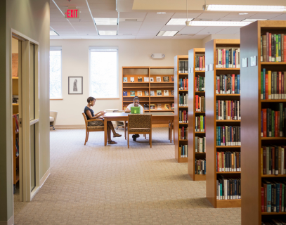 Students studying in the Stone Center Library