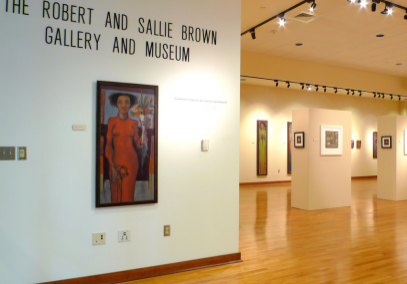 Artwork hanging in The Robert and Sallie Brown Gallery at the Stone Center